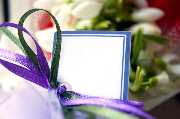 Blank note with ribbons — Stock Photo, Image