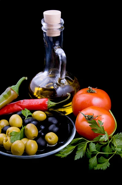 Olive oil, tomatoes, pepper and greens — Stock Photo, Image