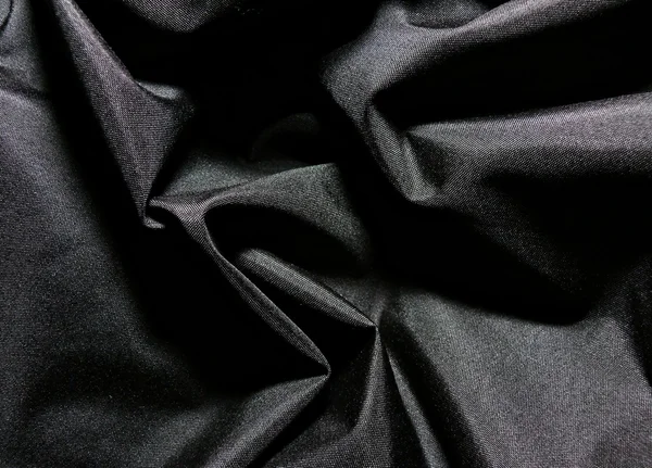 Schwarzer Stoff Als Hintergrund — Stockfoto