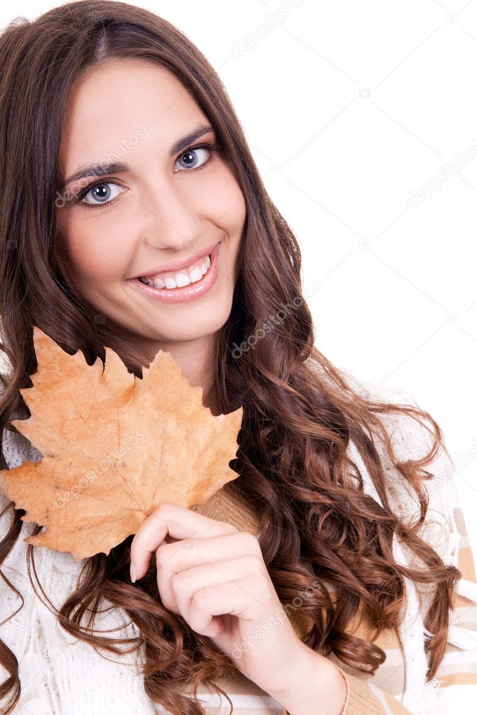 Close-up of woman holding leaf