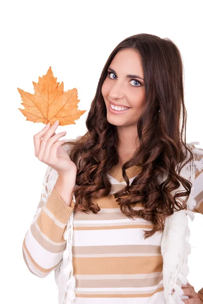 Happy attractive autumn woman holding leaf — Stock Photo, Image