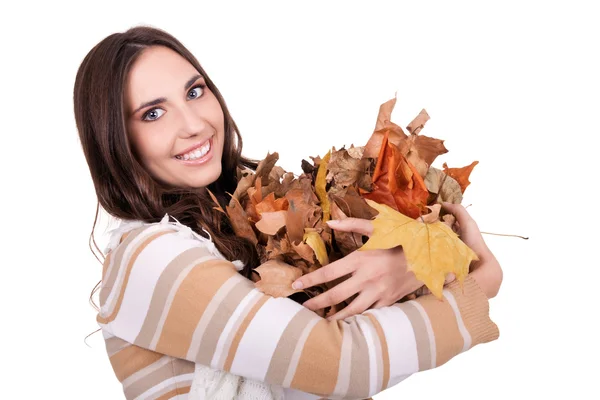 Autumn woman holding a pile of leaves — Stock Photo, Image