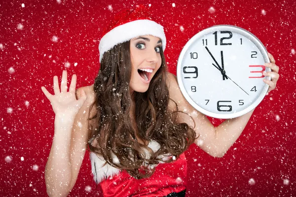 Nästan nytt år - santa flicka, klocka, snö koncept — Stockfoto