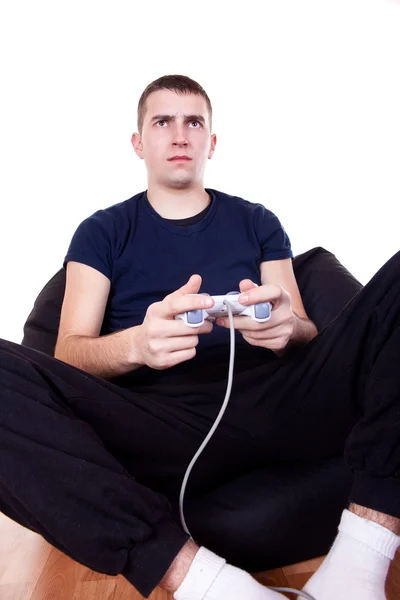 Young man playing computer game — Stock Photo, Image