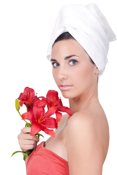 Žena po koupeli s květinou — Stock fotografie