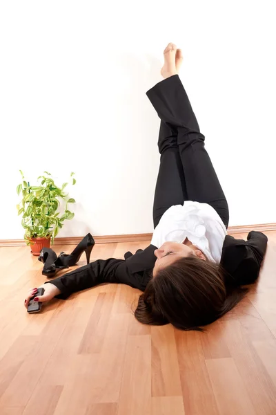 Woman with her legs up — Stock Photo, Image