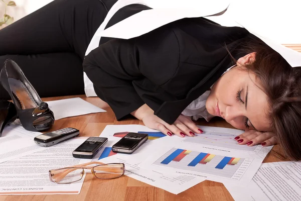 Overworked businesswoman — Stock Photo, Image