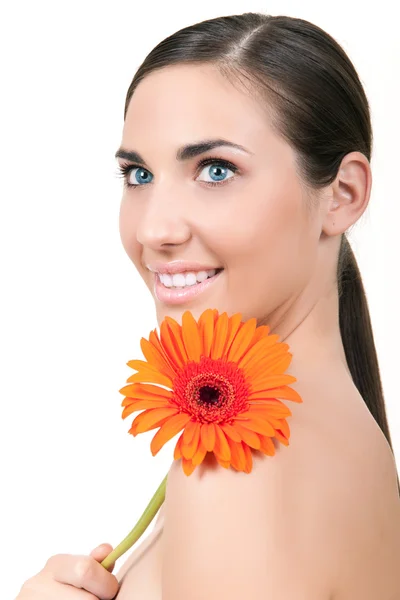 Woman with flowers on shoulder — Stock Photo, Image