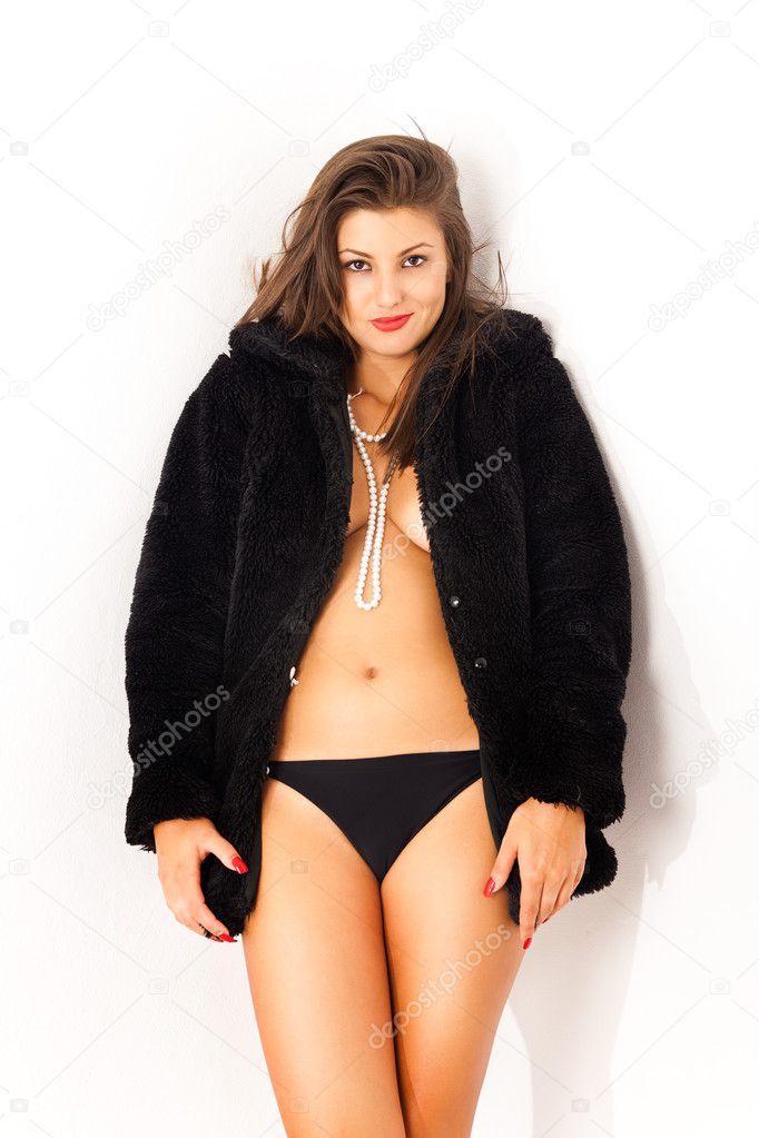 Girl posing in fur coat