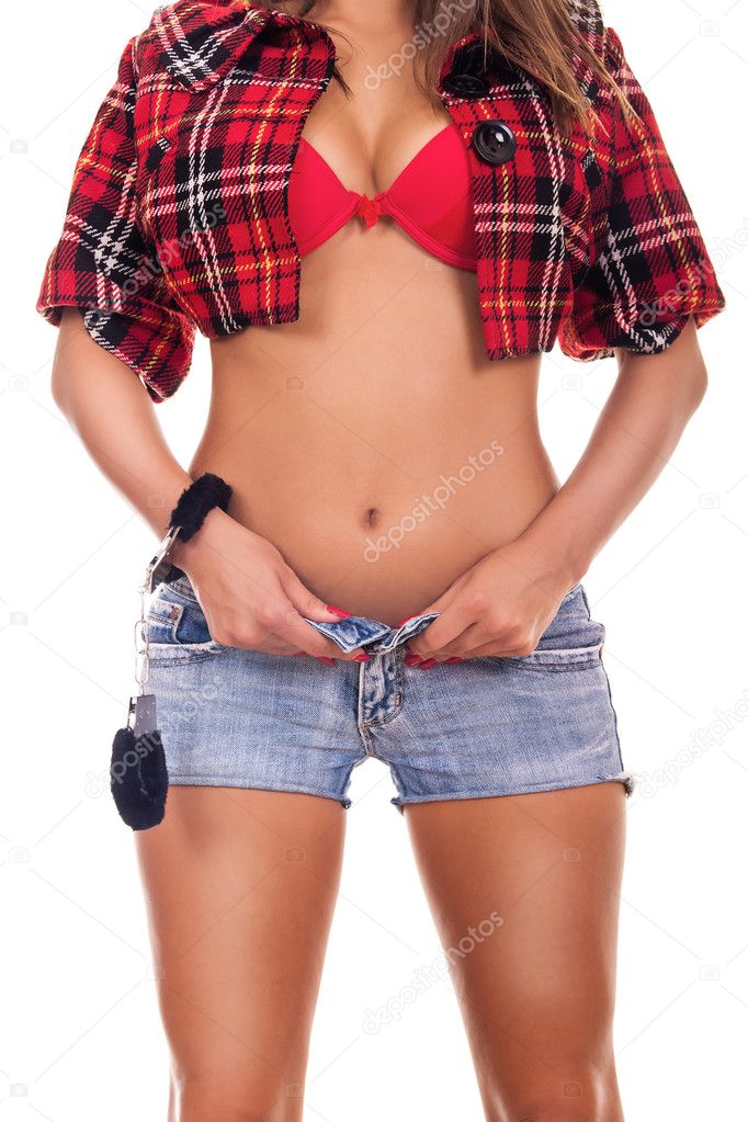Woman takes off denim shorts