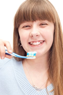 Little girl brushing teeth clipart