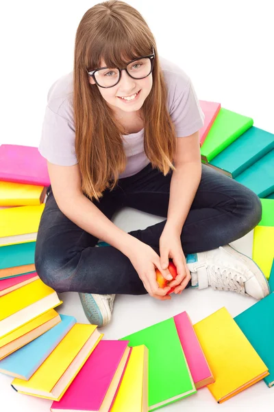 Child with lot of books siting on floor — Stock Photo, Image