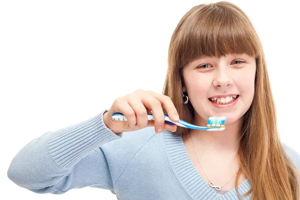 Teenager brushing teeth — Stock Photo, Image