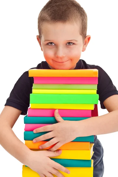 Pupil with huge pile of books — Stock Photo, Image