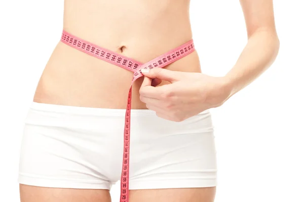 Girl measuring slim waist — Stock Photo, Image