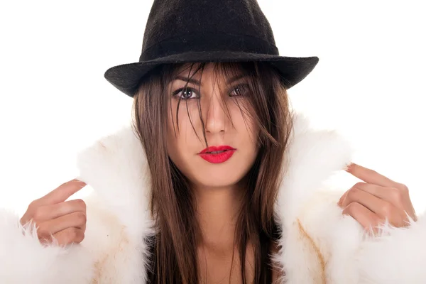 Sexig kvinna poserar med hatt — Stockfoto