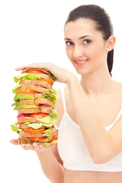 Mujer sosteniendo sándwich grande —  Fotos de Stock
