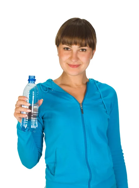 Молодая девушка с бутылкой воды — стоковое фото