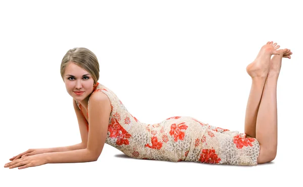 Yerde Yatarken Güzel Kırmızı Elbiseli Güzel Genç Kadın — Stok fotoğraf