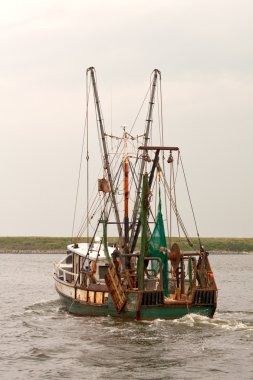 Fishing trawler on Pamlico Sound vertical clipart