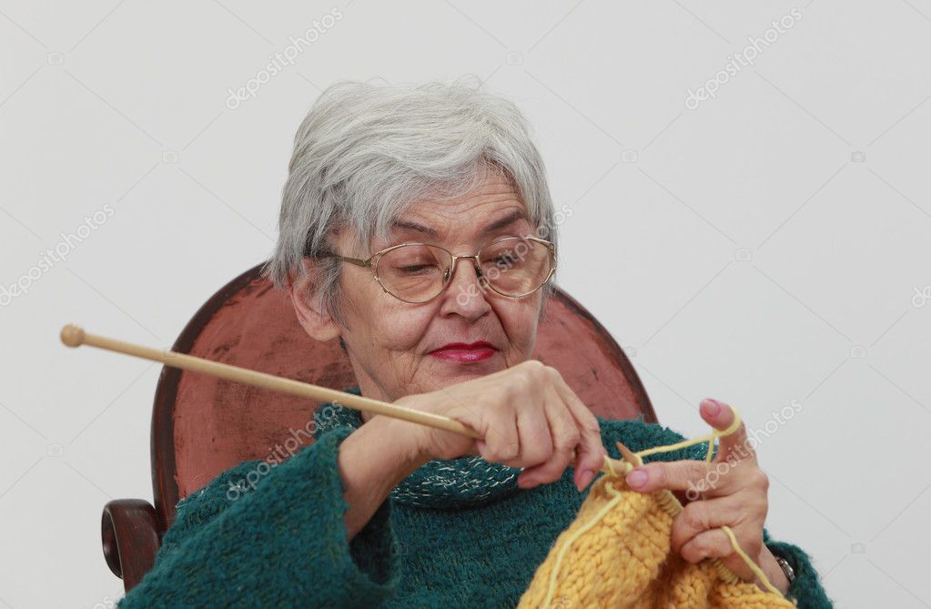 Old woman knitting — Stock Photo © razvanphoto 3942615