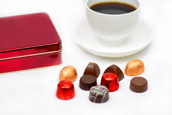 Chocolates e café — Fotografia de Stock