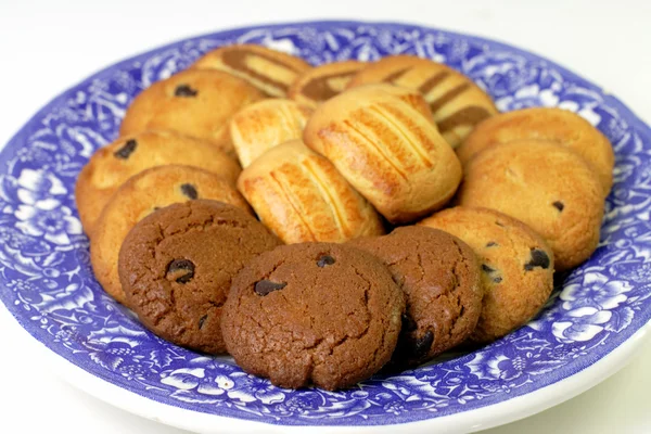 Plate with fancy biscuits — Stock Photo, Image
