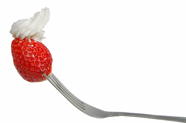 Strawberry with whip in a fork — Stock Photo, Image