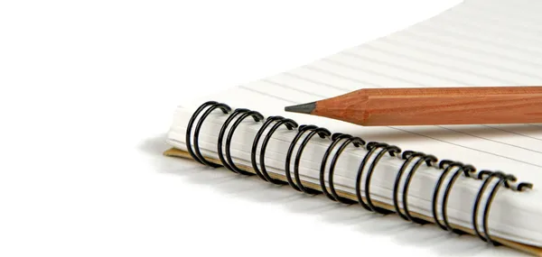 Crayon on notebook — Stock Photo, Image