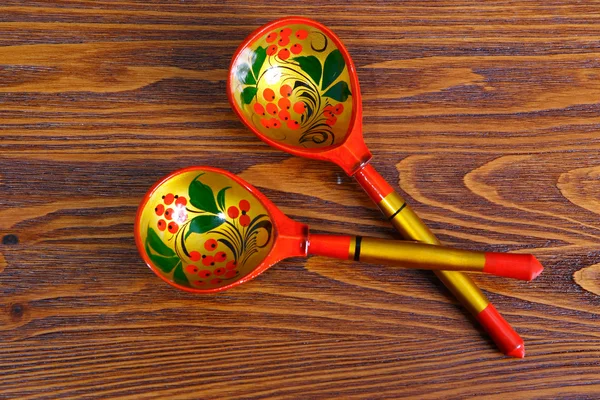 stock image Wooden spoons, onions, potato on kitchen