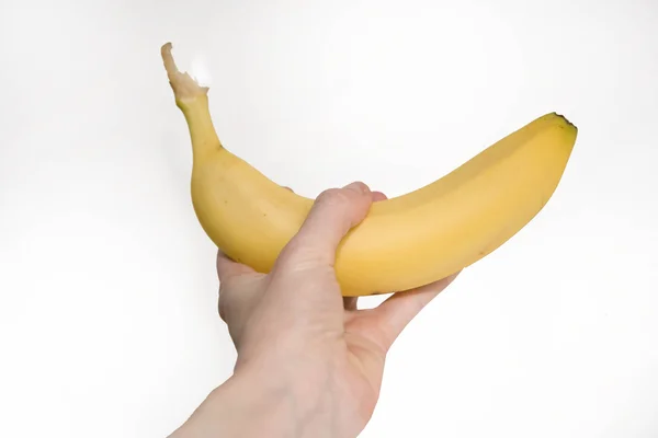 Banana in hand — Stock Photo, Image