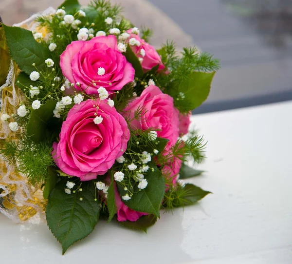 Wedding Bouquet of the bride from pink roses Stock Photo