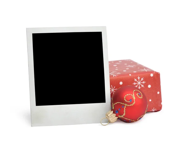 Old photograph and a Christmas ball — Stock Photo, Image