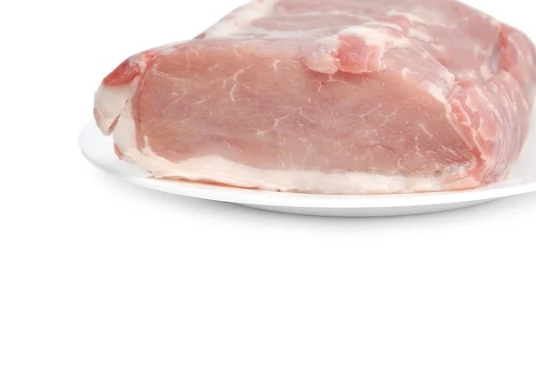 Riesiges rohes Fleisch auf dem Teller — Stockfoto
