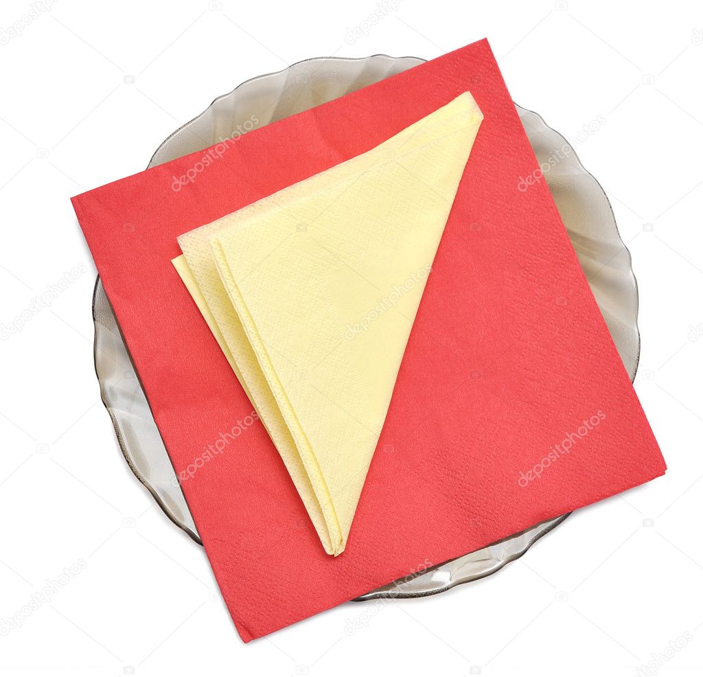 Paper napkins on the black plate, isolated on white
