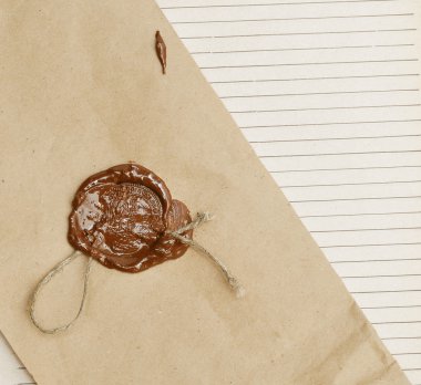 Old paper with wax seal clipart