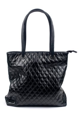 Black quilted bag on a white background