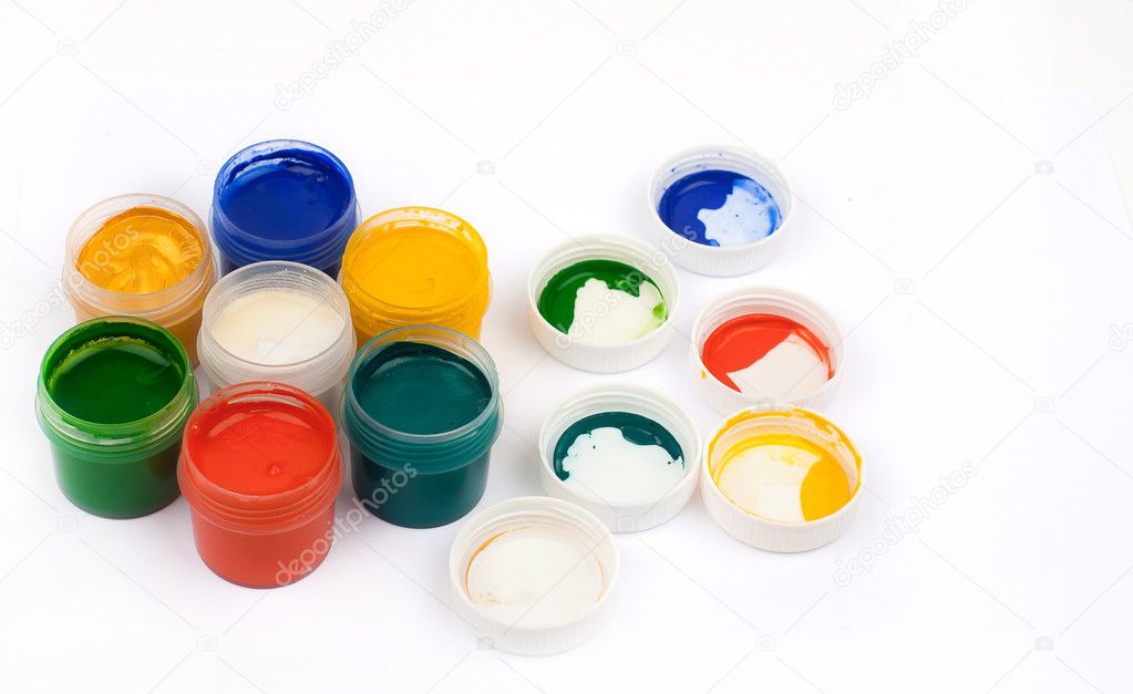 Open jars with gouache paints