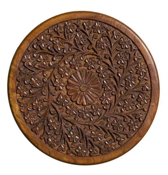 Gesneden circulaire houten paneel met bloemmotief — Stockfoto