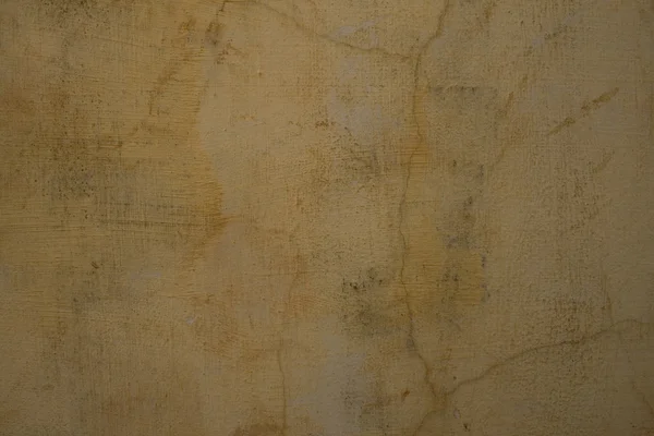 Pęknięty piaszczystej jasnoszara tynk ściany — Zdjęcie stockowe