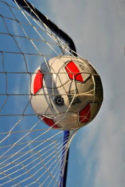 Goal, soccerball in net - closeup clipart