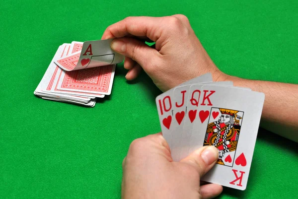 Poker in hand Rechtenvrije Stockfoto's
