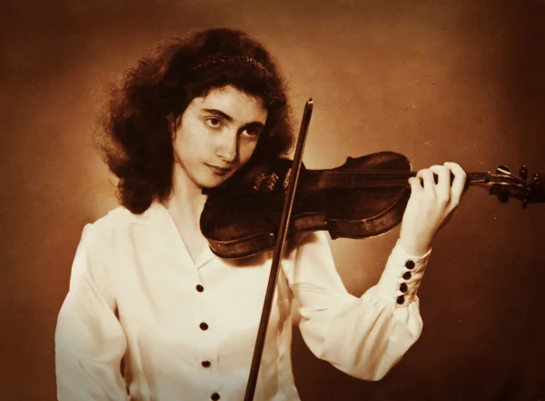 stock image Old photo of a girl playing violin