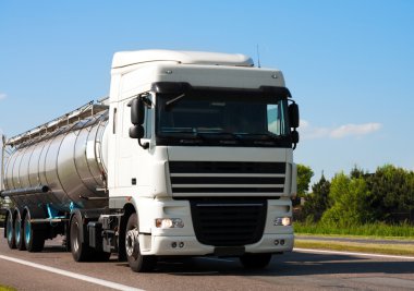 Tanker truck on highway clipart