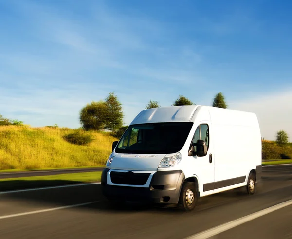 White delivery van on gighway — Stock Photo, Image
