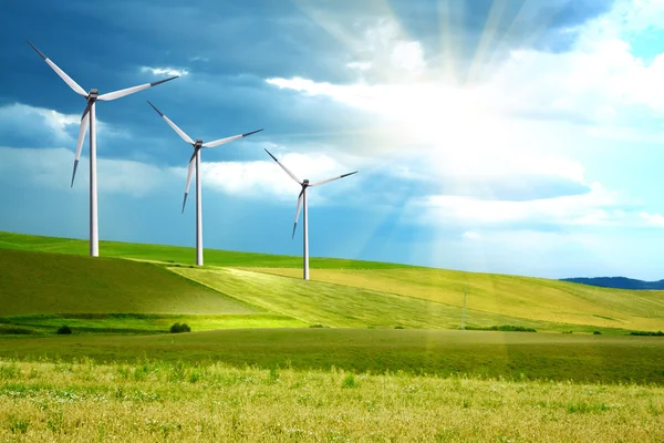 Wind turbines farm on green island — Stock Photo, Image