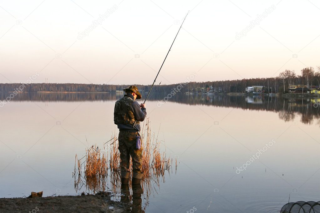 Fishing spinning at sunset