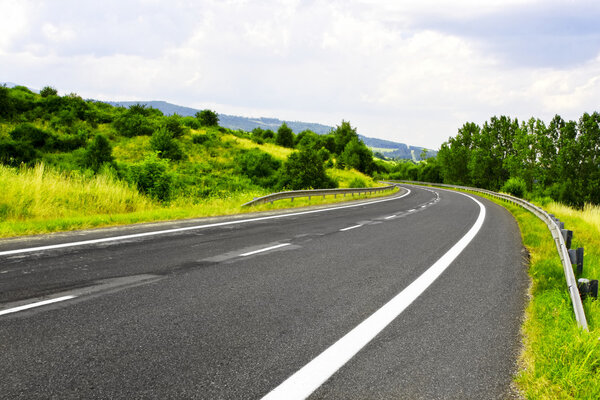 Mountain road and blue sky