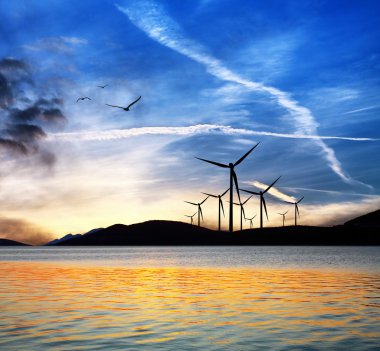 Seascape with wind turbines clipart