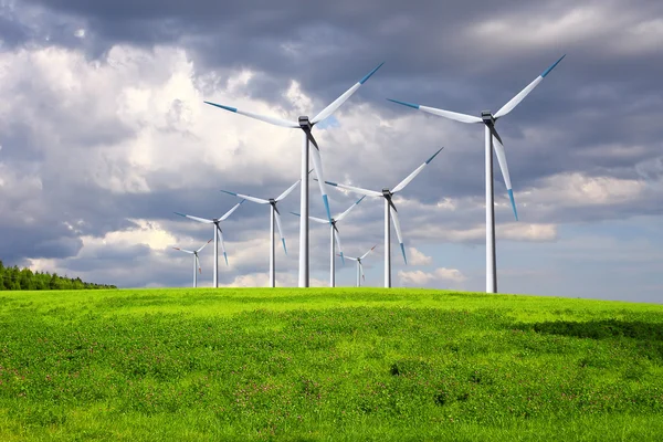 Windmills on summer field — Stock Photo, Image